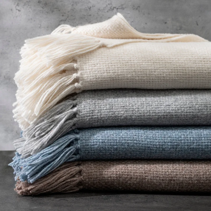 Celebrate the Weekend with Discounts Matouk Lanza Throw Collection